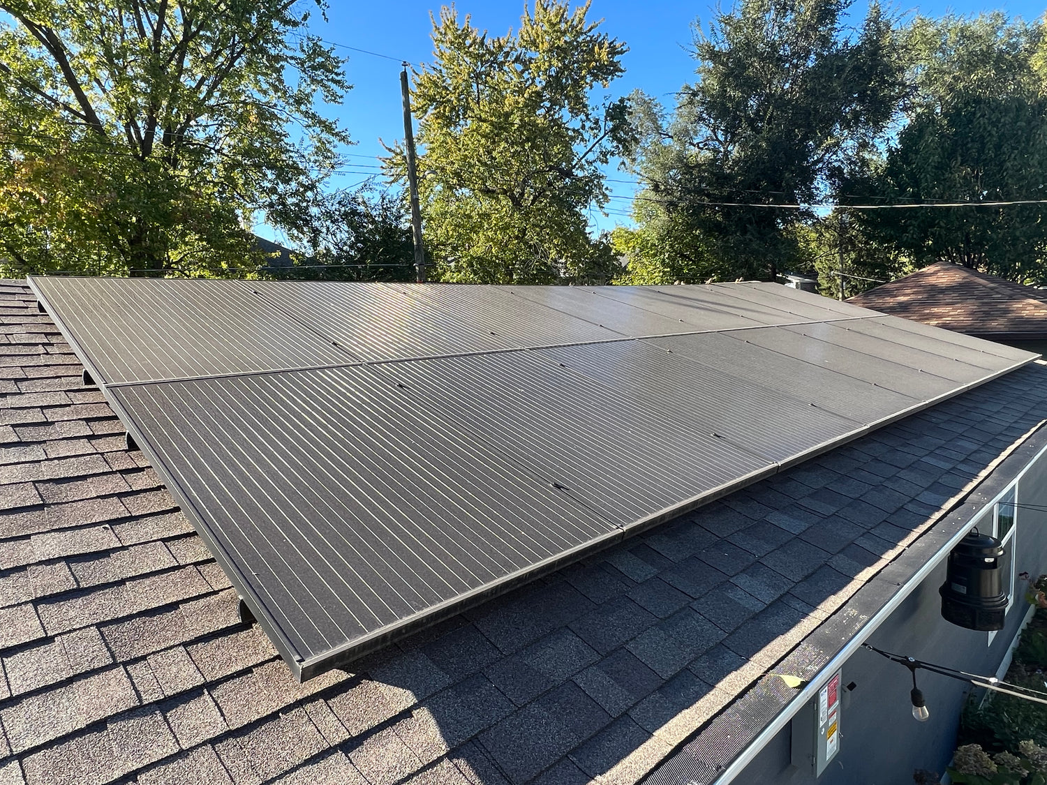 Roof of roastery with solar panels on top
